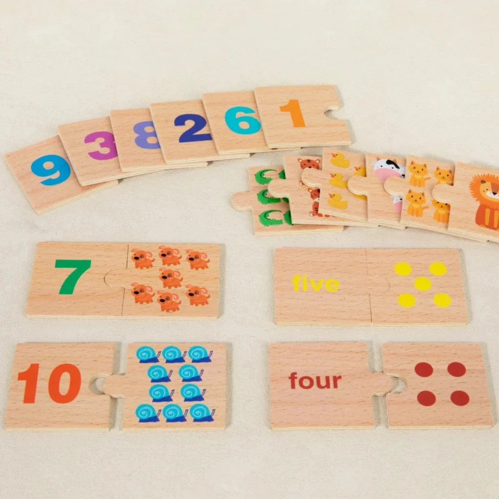 Close-up of hands placing a puzzle piece, matching number 10 to ten blue snail illustrations on a Montessori math puzzle board.
