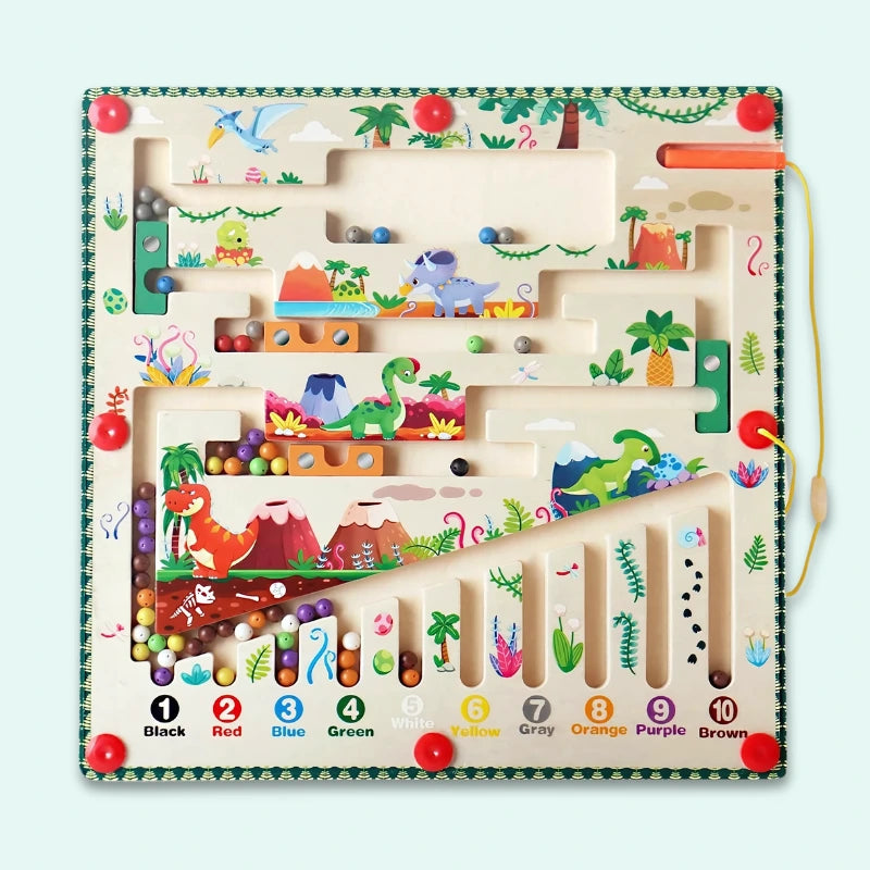 Close-up of the Dinosaur Magnetic Maze featuring vibrant artwork with volcanoes, palm trees, and dinosaur characters, with ten color-coded channels numbered 1-10 for progressive difficulty play
